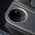 Close-up of TESEVO silicone cup holder insert in Model YL third-row armrest
