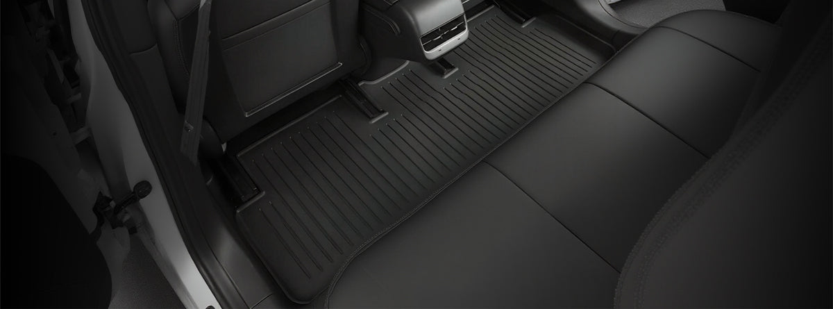 TESEVO TPE all-weather floor mats installed in a Tesla cabin