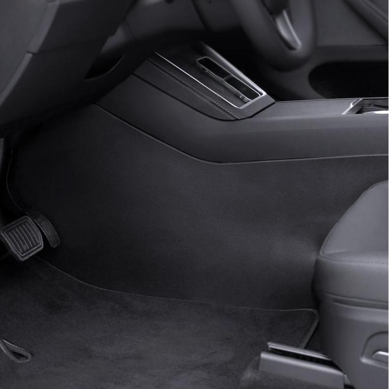 Tesevo anti-kick mats installed on Tesla Model Y Juniper center console side