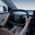 TESEVO Starlink 4.0 Cyber yoke steering wheel Highland Juniper installed view