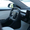 TESEVO Starlink 4.0 Cyber yoke steering wheel Highland Juniper close-up detail